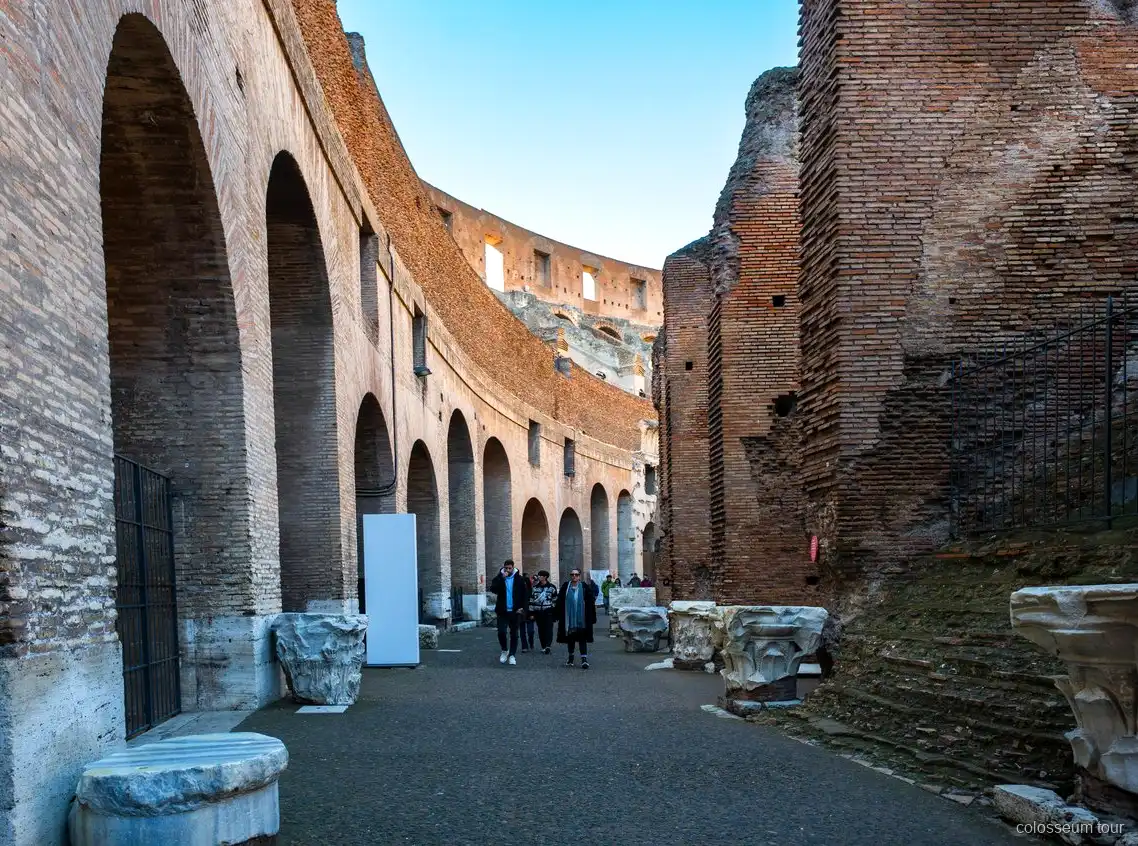 Small group exploring the Colosseum Arena Floor with an expert guide